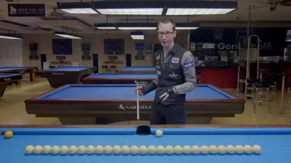 Record holder tutorial: Pool trick shot pro Florian Kohler shows you how to execute a jump shot